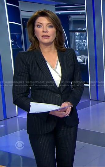 Norah’s navy pinstripe suit on CBS Evening News