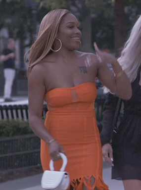 Orange strapless fringe dress on The Real Housewives of Potomac