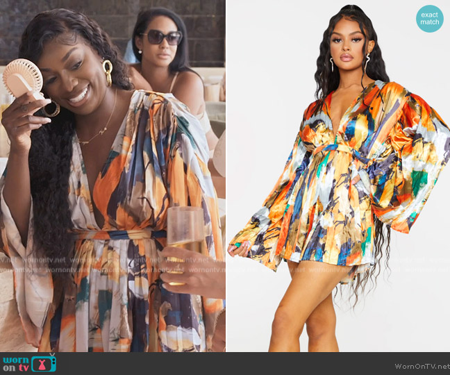 Pretty Little Thing Orange Abstract Plunge Pleated Romper worn by Wendy Osefo on The Real Housewives of Potomac