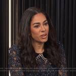 Sharon Carpenter’s navy floral embroidered dress on E! News