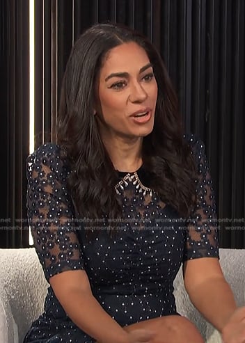 Sharon Carpenter’s navy floral embroidered dress on E! News