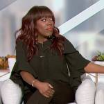 Sheryl’s green tie neck blouse on The Talk