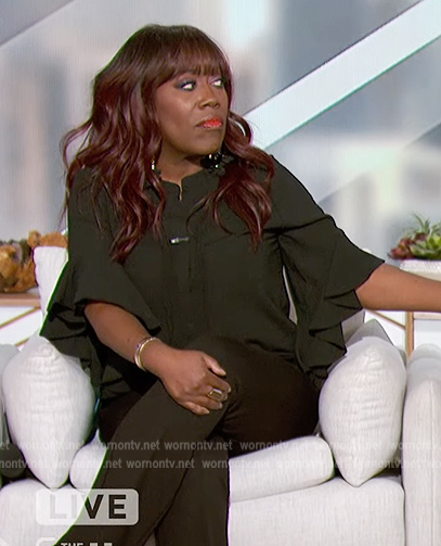 Sheryl’s green tie neck blouse on The Talk