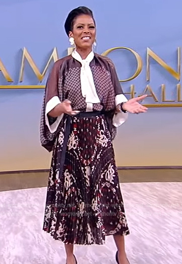 Tamron's printed blouse and pleated skirt on Tamron Hall Show