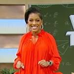 Tamron’s red ruffled hem blouse on Tamron Hall Show