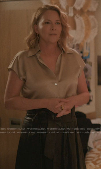 Tina’s champagne blouse and leather skirt on The L Word Generation Q