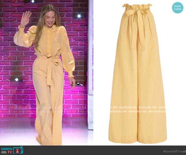 WornOnTV: Margot Robbie’s yellow ruffle blouse and belted pants on The