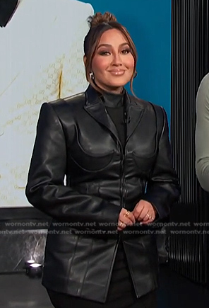 Adrienne’s black cutout leather blazer on E! News