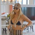 Alexia’s beige plaid biker shorts and baseball cap on The Real Housewives of Miami