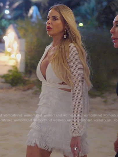 Alexia’s white fringe trim mini dress on The Real Housewives of Miami