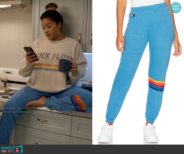 Aviator Nation Rainbow Stitch Sweatpant in Ocean worn by Nell Serrano (Gina Rodriguez) on Not Dead Yet