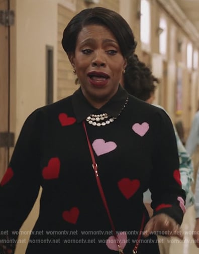 Barbara's black heart print sweater on Abbott Elementary