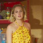 Bridge’s yellow floral halter jumpsuit on Fantasy Island