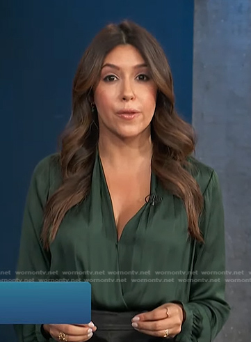 Camille Vasquez’s green surplice blouse on Access Hollywood