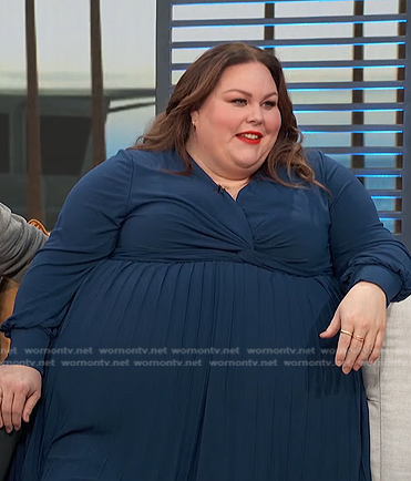 Chrissy Metz’s navy pleated dress on Access Hollywood