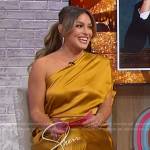 Emily Orozco’s gold satin one shoulder top and pants on Sherri