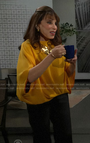 Esther's yellow blouse on The Young and the Restless