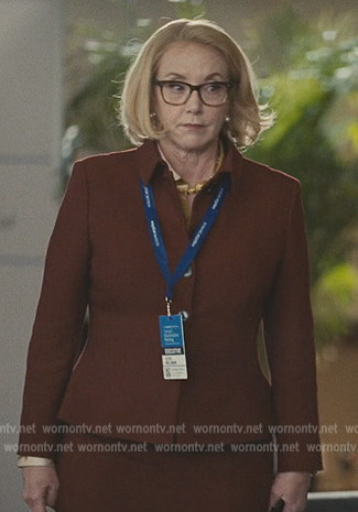 Gerri's burgundy jacket and skirt on Succession