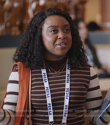 Janine's brown contrast stripe sweater on Abbott Elementary