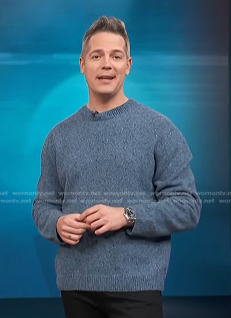 Jason Kennedy’s blue speckled sweater on Access Hollywood