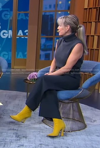 Jennifer’s grey sleeveless turtleneck and yellow boots on Good Morning America