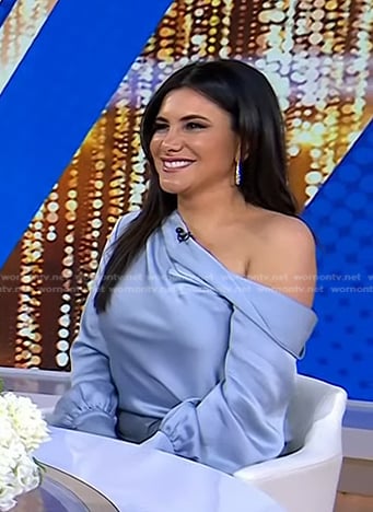 Joelle Garguilo’s blue one off-shoulder satin top on Today