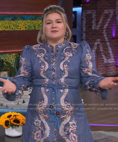 Kelly’s blue floral print belted dress on The Kelly Clarkson Show