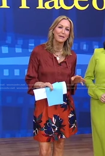 Lara’s brown blouse and floral mini skirt on Good Morning America