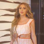 Larsa’s orange printed cutout dress on The Real Housewives of Miami