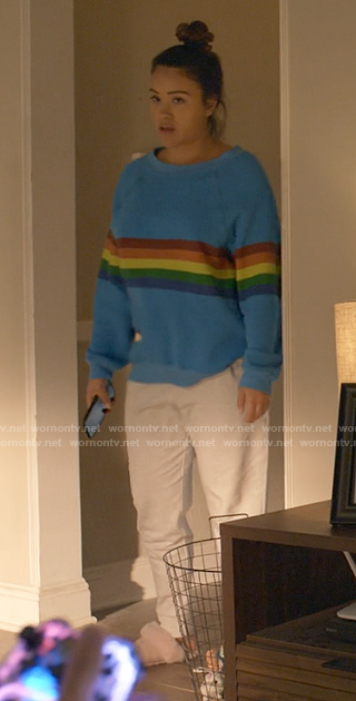 Nell's blue sweatshirt with rainbow stripes on Not Dead Yet