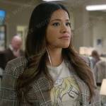 Nell’s graphic tee and grey plaid blazer on Not Dead Yet