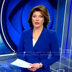 Norah’s blue collarless blazer and pants on CBS Evening News