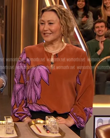 Robin Black’s orange floral print blouse on The Drew Barrymore Show