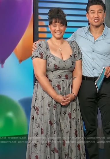 Ronni Johnson’s gray printed sweetheart maxi dress on Access Hollywood