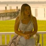 Sarah’s white and blue floral tank top and colorblock denim shorts on Outer Banks