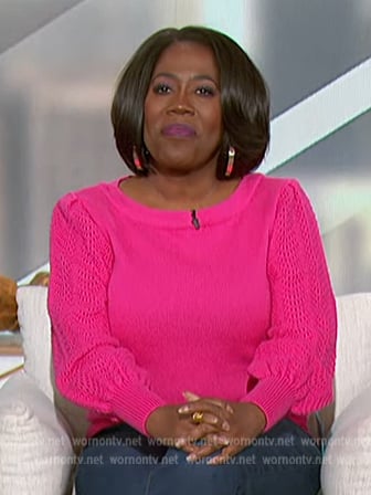 Sheryl Underwood’s pink pointelle knit sleeve sweater on The Talk