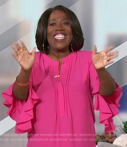 Sheryl’s pink ruffle sleeve blouse on The Talk