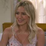 Sophie’s white floral lace-trim cami on How I Met Your Father