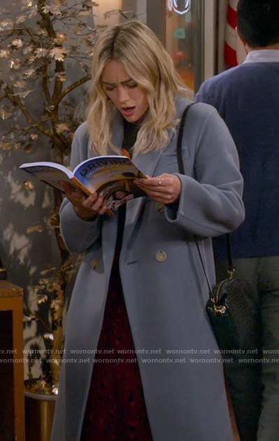 Sophie’s blue oversized coat on How I Met Your Father
