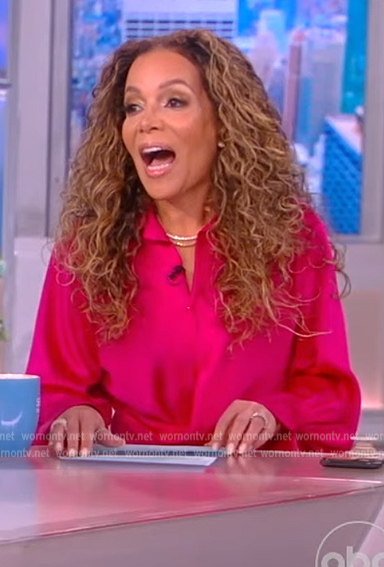 Sunny’s pink satin wrap dress on The View