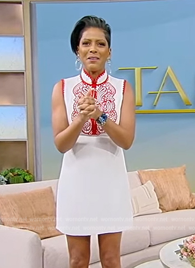 Tamron's white embroidered mini dress on Tamron Hall Show