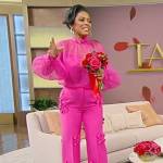 Tamron’s pink mesh blouse with floral pants on Tamron Hall Show