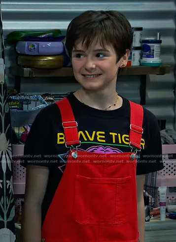 Winnie’s black print tee and red overalls on Bunkd