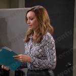 Gwen’s snakeskin print blouse and leather mini skirt on Days of our Lives