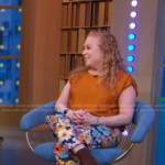 Jodi  Picoult’s orange top and floral pants on Good Morning America