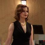 Megan Hathaway’s black sleeveless surplice dress on Days of our Lives