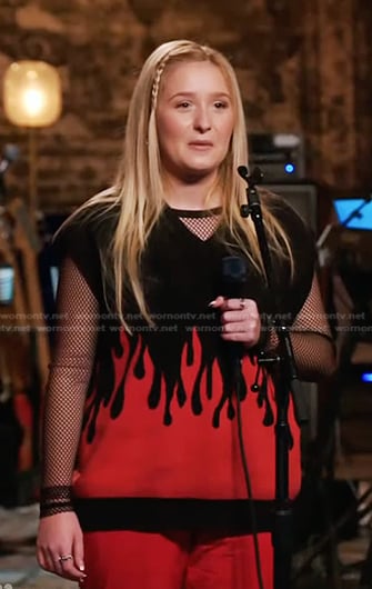 Ana Heichel's black and red flame vest on The Voice