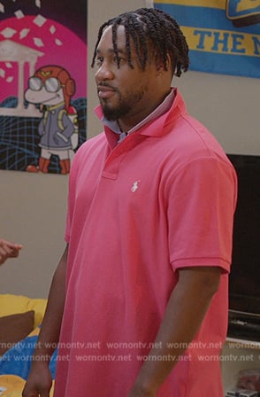 Anthony's pink polo on Grand Crew