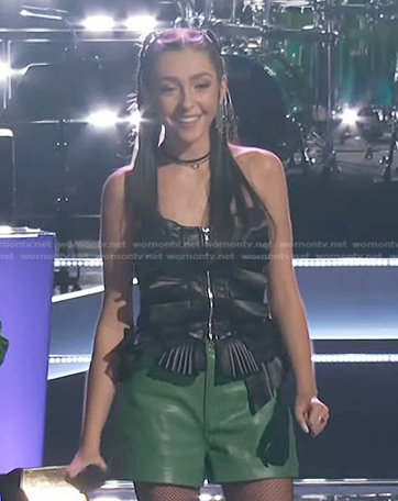 Bella Heichel's black ruffled leather zip top on The Voice