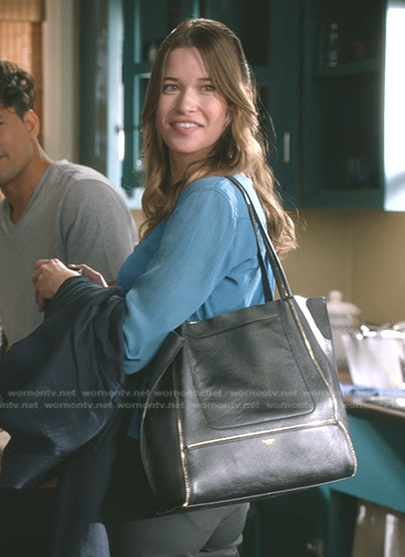 black leather tote bag with gold trim on Greys Anatomy